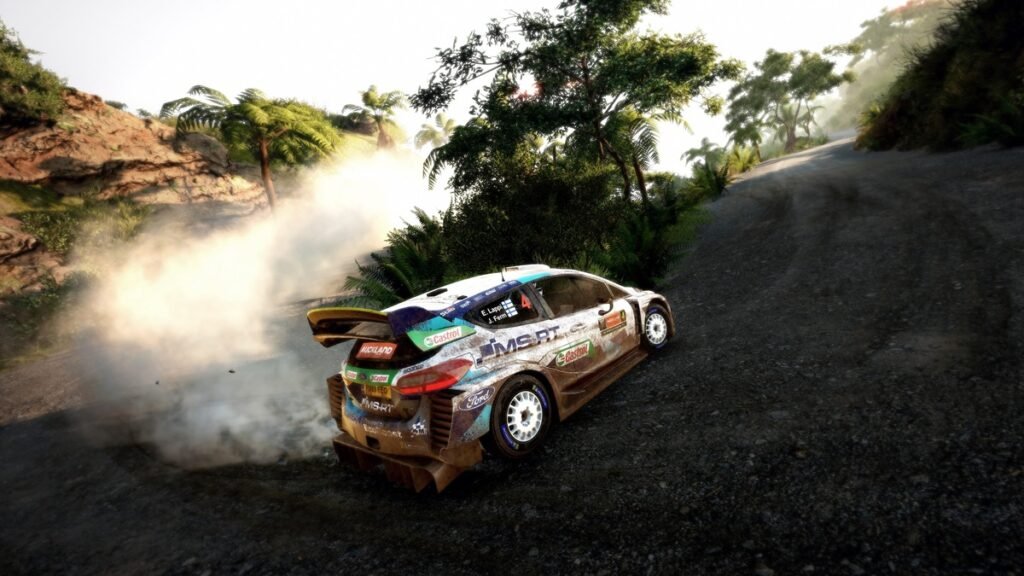 WRC 9 PS5 gameplay de rally con autos de competición en un circuito de tierra